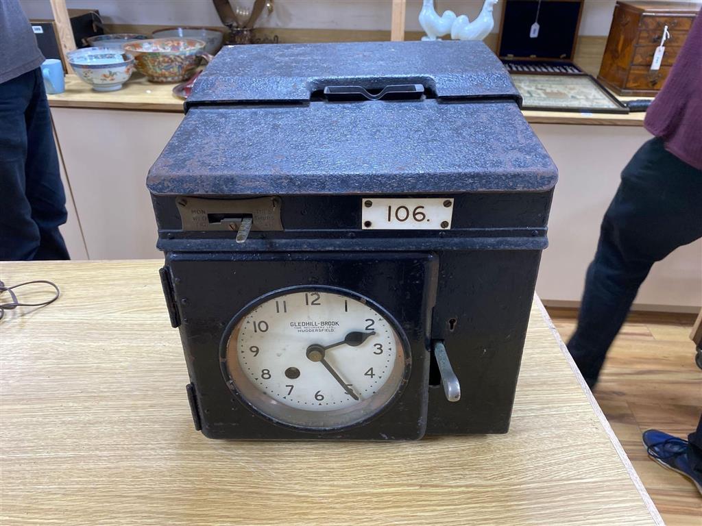 A Gledhill-Brook time recording clock, sheet iron case with carrying handles, 34cm wide